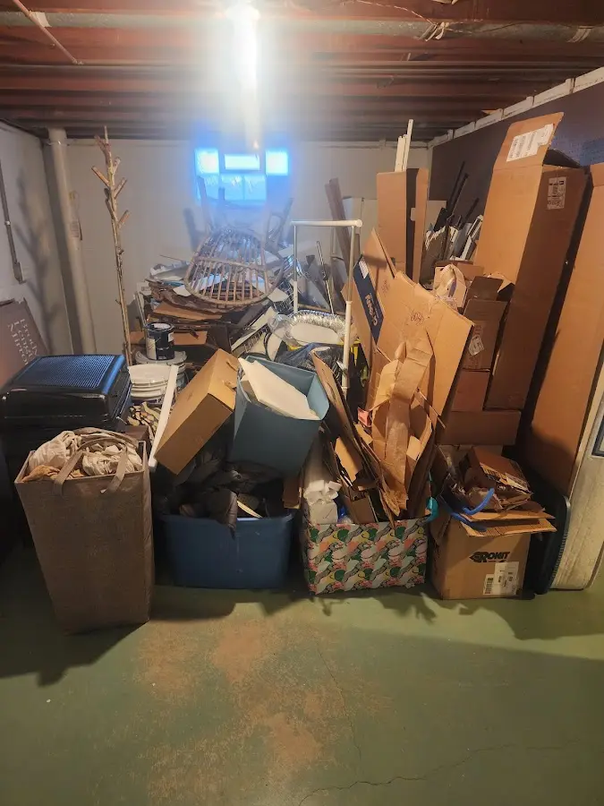 Roll-off dumpster container at job site for 15 Yard Dumpster Rental in Solon